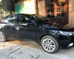 Kia Forte   SX 1.6 MT  2011 - Cần bán Kia Forte SX 1.6 MT sản xuất năm 2011, màu đen xe gia đình giá 320 triệu tại Hà Giang