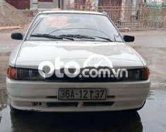 Mazda 323 1996 - Cần bán lại xe Mazda 323 2.0MT sản xuất 1996, màu trắng, xe nhập giá 23 triệu tại Nam Định