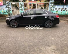 Kia Forte 2011 - Cần bán xe Kia Forte SX 2.4 AT năm 2011, màu đen  giá 320 triệu tại Lào Cai