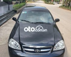 Daewoo Lacetti EX 2009 - Cần bán Daewoo Lacetti EX năm 2009, màu đen xe gia đình giá 128 triệu tại Hải Dương