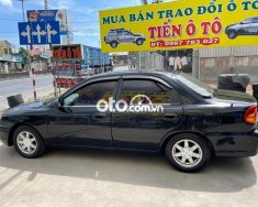 Kia Spectra 2002 - Cần bán xe Kia Spectra năm sản xuất 2002, màu đen chính chủ, 79tr giá 79 triệu tại Tiền Giang