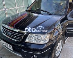 Ford Escape 2.3L AT 2004 - Bán Ford Escape 2.3L AT sản xuất năm 2004, màu đen  giá 175 triệu tại Kon Tum