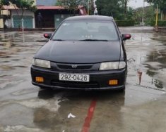 Mazda 323 2000 - Bán Mazda 323 năm 2000, màu đen số sàn giá 66 triệu tại Hải Phòng