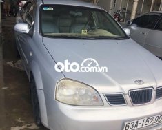 Daewoo Lacetti 2004 - Cần bán Daewoo Lacetti EX sản xuất năm 2004, màu bạc, 135 triệu giá 135 triệu tại Tiền Giang