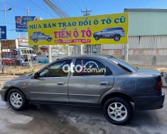 Mazda 323  GLX 1998 - Cần bán gấp Mazda 323 GLX năm sản xuất 1998, màu xám, giá chỉ 60 triệu giá 60 triệu tại Tiền Giang