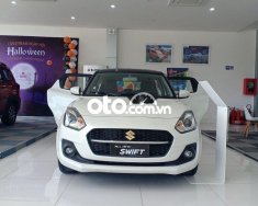 Suzuki Swift 2021 - Cần bán Suzuki Swift 1.4AT sản xuất 2021, màu trắng, xe nhập giá 550 triệu tại Cần Thơ