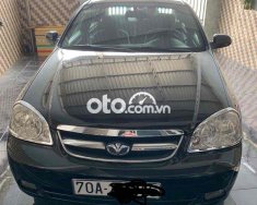 Cần bán lại xe Daewoo Lacetti EX sản xuất 2010, màu đen giá cạnh tranh giá 152 triệu tại Tây Ninh
