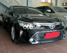 Cần bán lại xe Toyota Camry 2.0E năm sản xuất 2019, màu đen  giá 810 triệu tại Hà Nội