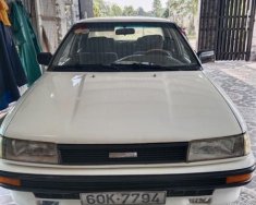 Toyota Corolla 1988 - Màu trắng giá 60 triệu tại Tp.HCM