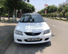 Mazda 323 2002 - Màu trắng giá 95 triệu tại Quảng Nam