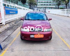 Fiat Albea 2006 -  màu đỏ, nhập khẩu nguyên chiếc còn mới giá 89 triệu tại Tp.HCM