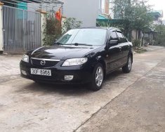 Mazda 323 2001 - Màu đen giá 105 triệu tại Ninh Bình