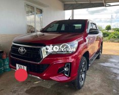 Toyota Hilux 2019 - Cần thanh lý xe màu đỏ giá 879 triệu tại Tp.HCM