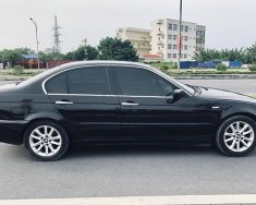 BMW 318i   2004 - Bán ô tô BMW 318i sản xuất 2004, màu đen giá 140 triệu tại Hải Phòng
