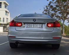 BMW 320i 2013 - Cần bán gấp BMW 320i sản xuất 2013, màu bạc, giá tốt giá 625 triệu tại Nam Định