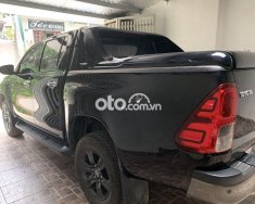 Toyota Hilux Bán xe  2.4E, màu đen, 1 cầu STĐ, ĐK T7/2021. 2021 - Bán xe Hilux 2.4E, màu đen, 1 cầu STĐ, ĐK T7/2021. giá 745 triệu tại Tuyên Quang