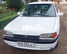 Mazda 323 1996 - Xe màu trắng, nhập khẩu nguyên chiếc giá 29 triệu tại Bình Thuận  