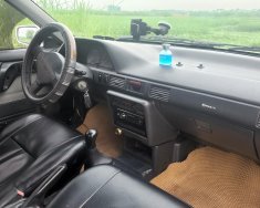 Mazda 323 1995 - Cần bán xe màu trắng giá 75 triệu tại Thanh Hóa