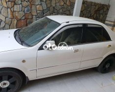 Ford Laser   2003 Ghia, số sàn, màu trắng 2003 - Ford laser 2003 Ghia, số sàn, màu trắng giá 107 triệu tại An Giang