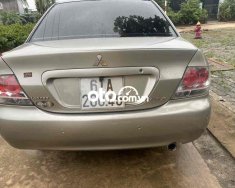 Mitsubishi Lancer E cần bán gấp chiếc   2004 tự động 2004 - E cần bán gấp chiếc Mitsubishi lancer 2004 tự động giá 145 triệu tại Bình Dương