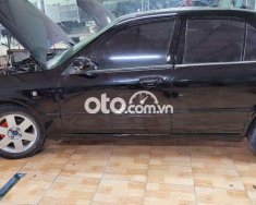 Ford Laser Bán xe fo mầu đen ngay chủ cà vẹt 2004 - Bán xe fo mầu đen ngay chủ cà vẹt giá 95 triệu tại Đồng Nai