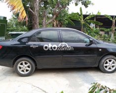 Toyota Corolla Cần bán xe   2002 màu đen 2002 - Cần bán xe Toyota corolla 2002 màu đen giá 145 triệu tại Đắk Lắk