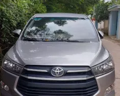 Toyota Innova 2016 - Chính chủ bán xe TOYOTA INNOVA 2.0E sản xuất năm 2016 giá 450 triệu tại Hà Nội