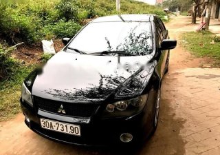 Mitsubishi IO 2009 - Cần bán gấp Mitsubishi IO đời 2009, màu đen, nhập khẩu