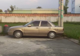 Nissan Sunny G 1997 - Cần bán xe Nissan Sunny đời 1992, màu vàng, nhập khẩu chính hãng, giá 58tr
