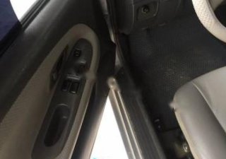Mitsubishi Lancer 2000 - Cần bán Mitsubishi Lancer đời 2000, màu bạc