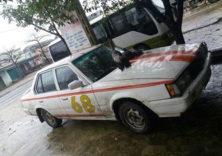 Toyota Corona 1984 - Bán xe cũ Toyota Corona đời 1984, màu trắng số sàn, 24tr