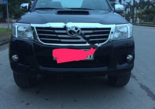 Toyota Hilux 4x2MT 2014 - Cần bán lại xe Toyota Hilux đời 2014, màu đen, nhập khẩu nguyên chiếc, 490tr