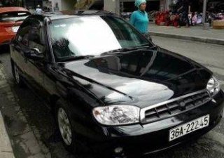 Kia Spectra   MT 1995 - Bán Kia Spectra MT đời 1995, màu đen số sàn