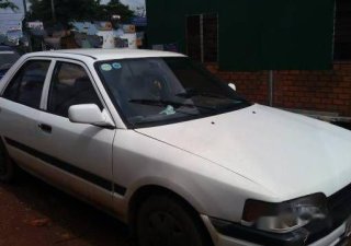 Mazda 323 MT 1995 - Bán xe Mazda 323 MT đời 1995, màu trắng chính chủ, giá chỉ 45 triệu