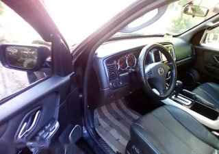 Mazda Tribute  AT  2009 - Bán ô tô Mazda Tribute AT đời 2009, số tự động, cửa sổ trời