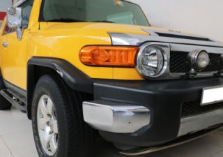 Toyota Fj cruiser   4.0 AT  2007 - Cần bán xe Toyota FJ Cruiser, Sx 2007, màu vàng, nội thất đen, ghế bọc nỉ