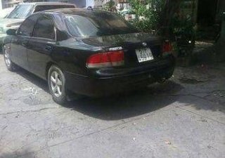 Mazda 626  MT 1996 - Bán xe Mazda 626 MT đời 1996, màu đen số sàn