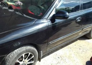 Kia Spectra    2004 - Bán ô tô Kia Spectra năm 2004, giá chỉ 180 triệu