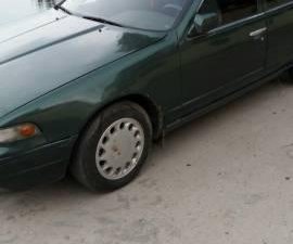 Nissan Altima 1995 - Cần bán Nissan Altima đời 1995, màu xanh