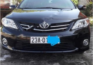 Toyota Corolla altis 1.8G AT 2014 - Bán Toyota Corolla altis 1.8G AT 2014, màu đen số tự động