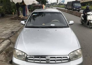 Kia Spectra   LS 2004 - Cần bán gấp Kia Spectra LS đời 2004, màu bạc