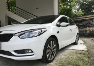 Kia K3 EXAT 2015 - Cần bán xe Kia K3 1.6 AT sản xuất 2015 màu trắng, 540 triệu