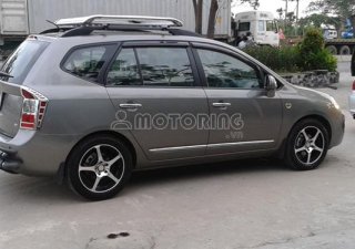 Kia Carens SX 2010 - Chính chủ cần bán Kia Carens 2010, màu ghi