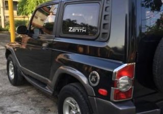 Ssangyong Korando 2004 - Cần bán Ssangyong Korando đời 2004, màu đen