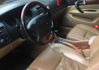 Daewoo Magnus 2.5 AT 2004 - Bán Daewoo Magnus 2.5 AT đời 2004, màu nâu, nhập khẩu xe gia đình