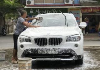 BMW X1   2012 - Bán BMW X1 đời 2012, màu trắng, nhập khẩu nguyên chiếc chính chủ, 900 triệu