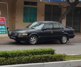 Nissan Bluebird   1994 - Bán Nissan Bluebird đời 1994, màu đen, giá tốt