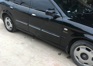 Daewoo Magnus 2.5 AT 2004 - Cần bán lại xe Daewoo Magnus 2.5 AT đời 2004, màu đen, nhập khẩu nguyên chiếc, giá tốt