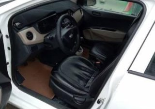 Hyundai i10   2014 - Bán xe Hyundai i10 sản xuất 2014, màu trắng