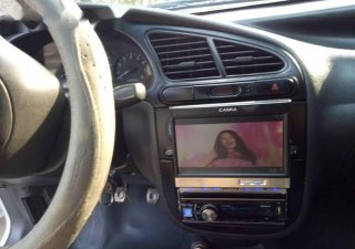 Daewoo Lanos   2004 - Cần bán gấp Daewoo Lanos đời 2004, màu trắng